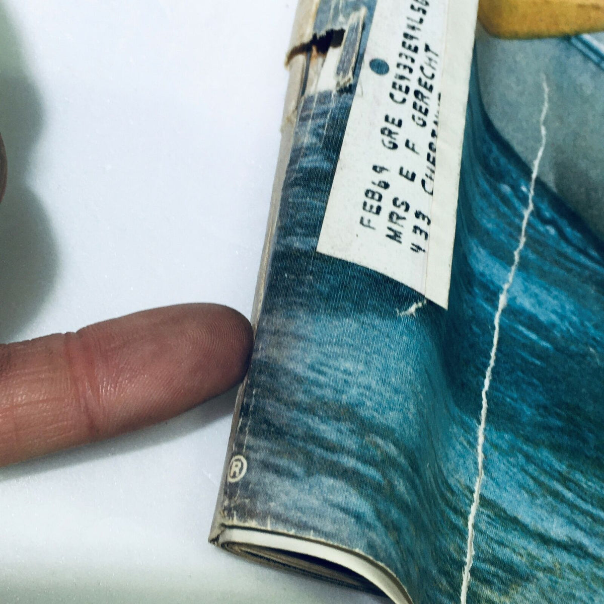 Detail of the binding of the VTG Life Magazine June 7 1968, highlighting an address label and vintage wear, emphasizing its collectible nature.