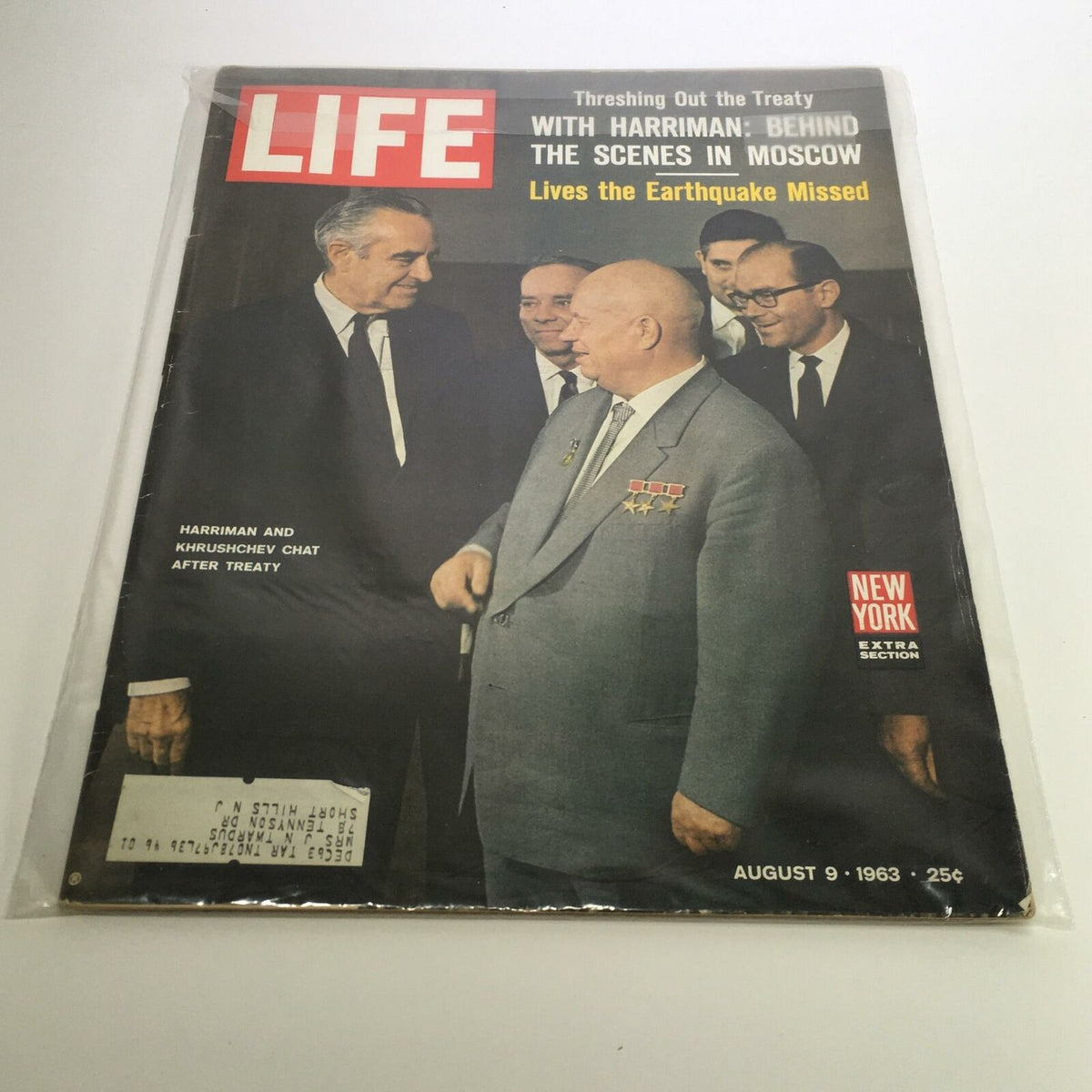 Cover of Life Magazine from August 9, 1963, featuring the title 'Threshing Out the Treaty with Harriman.' The image shows prominent figures engaged in conversation, including Harriman and Khrushchev after a treaty discussion.