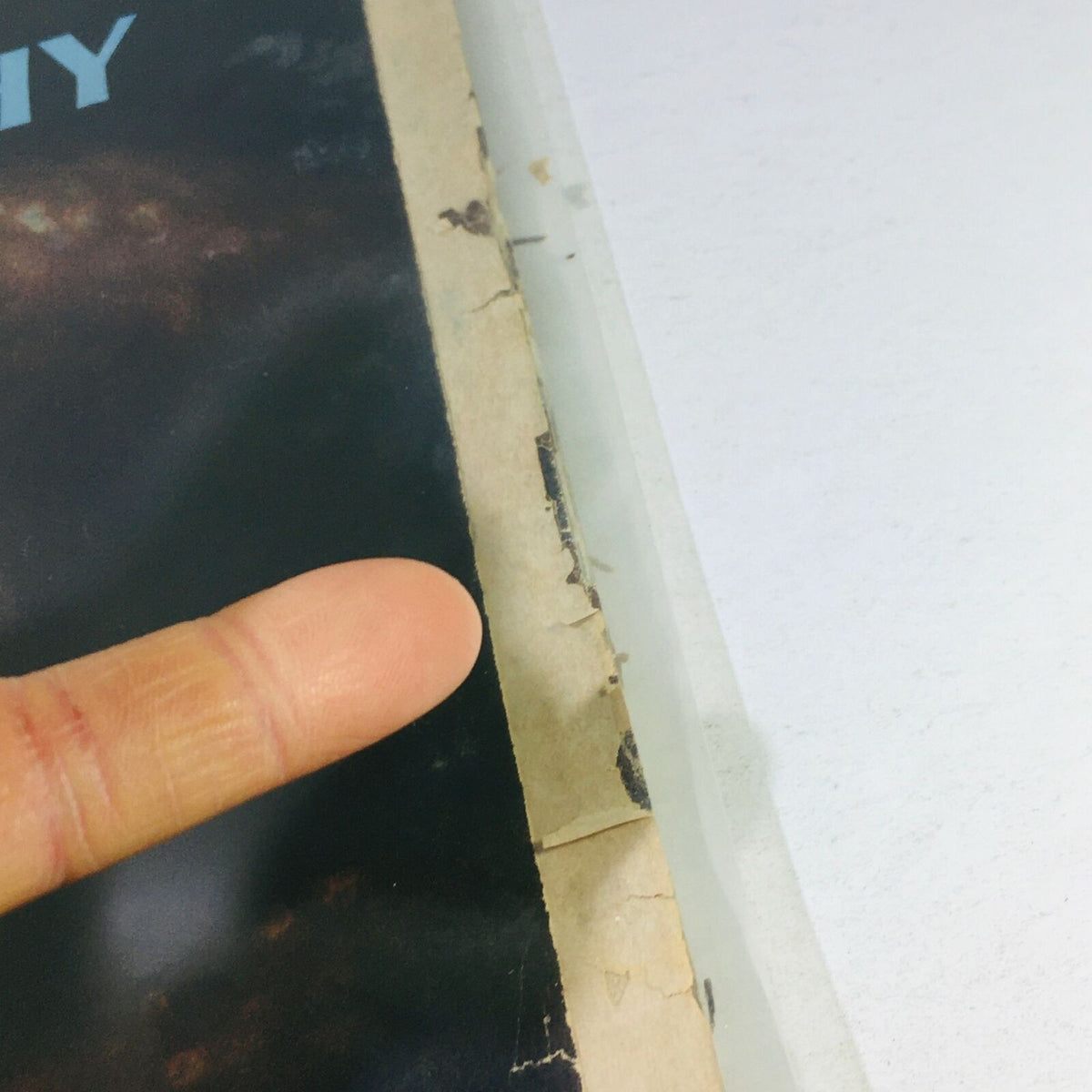Close-up of the edge of the VTG Life Magazine: December 23, 1966 showing wear and tear, emphasizing its vintage condition.