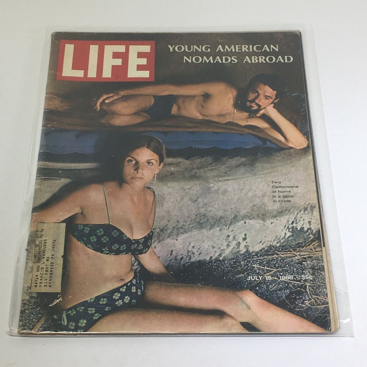 Vintage Life Magazine cover from July 19, 1968, featuring the title 'Two Californians at Home in a Cave in Crete,' showcasing a couple with a backdrop of cave living.