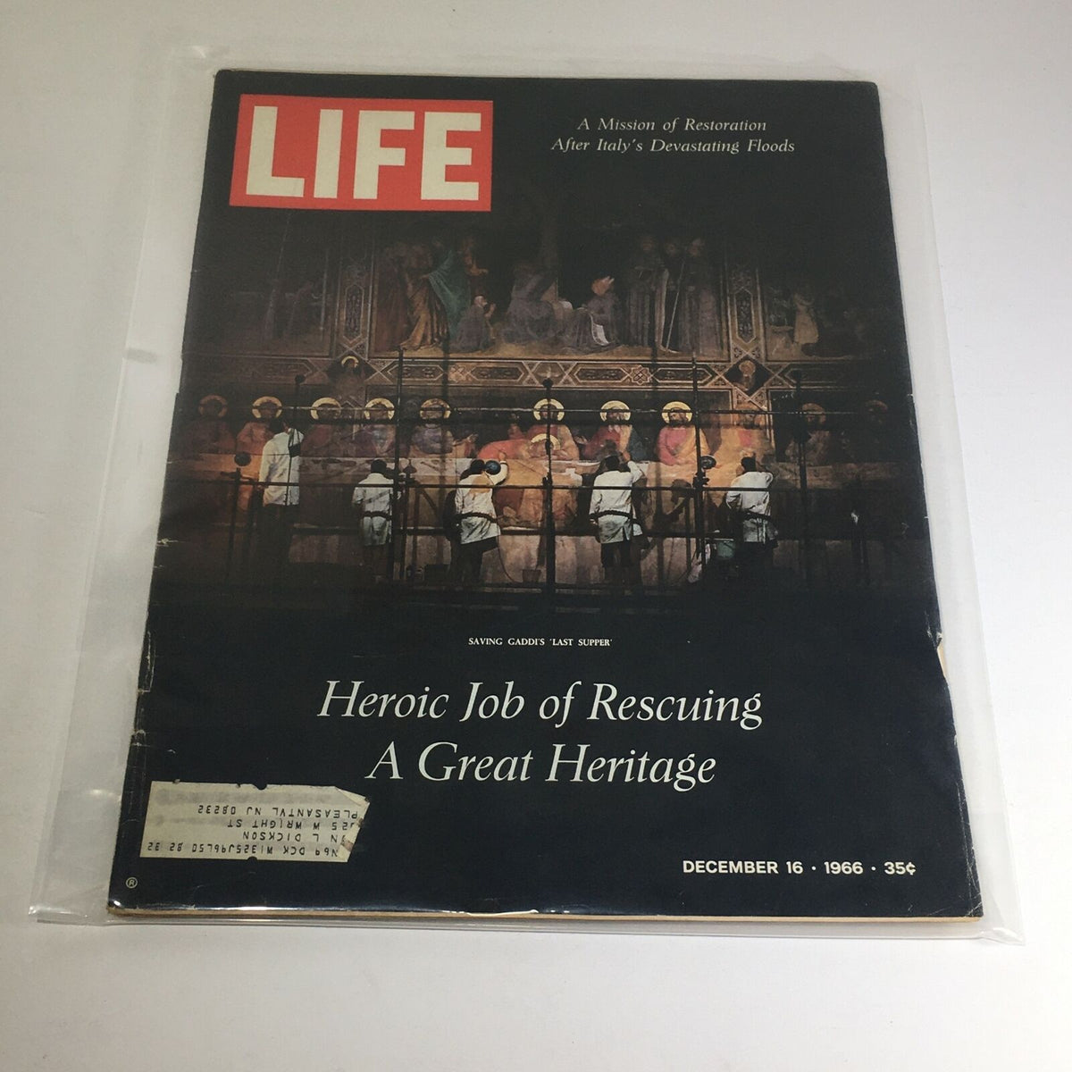 Vintage Life Magazine cover from December 16, 1966, titled 'Heroic Job of Rescuing A Great Heritage', featuring images of figures involved in restoration after Italy's floods.