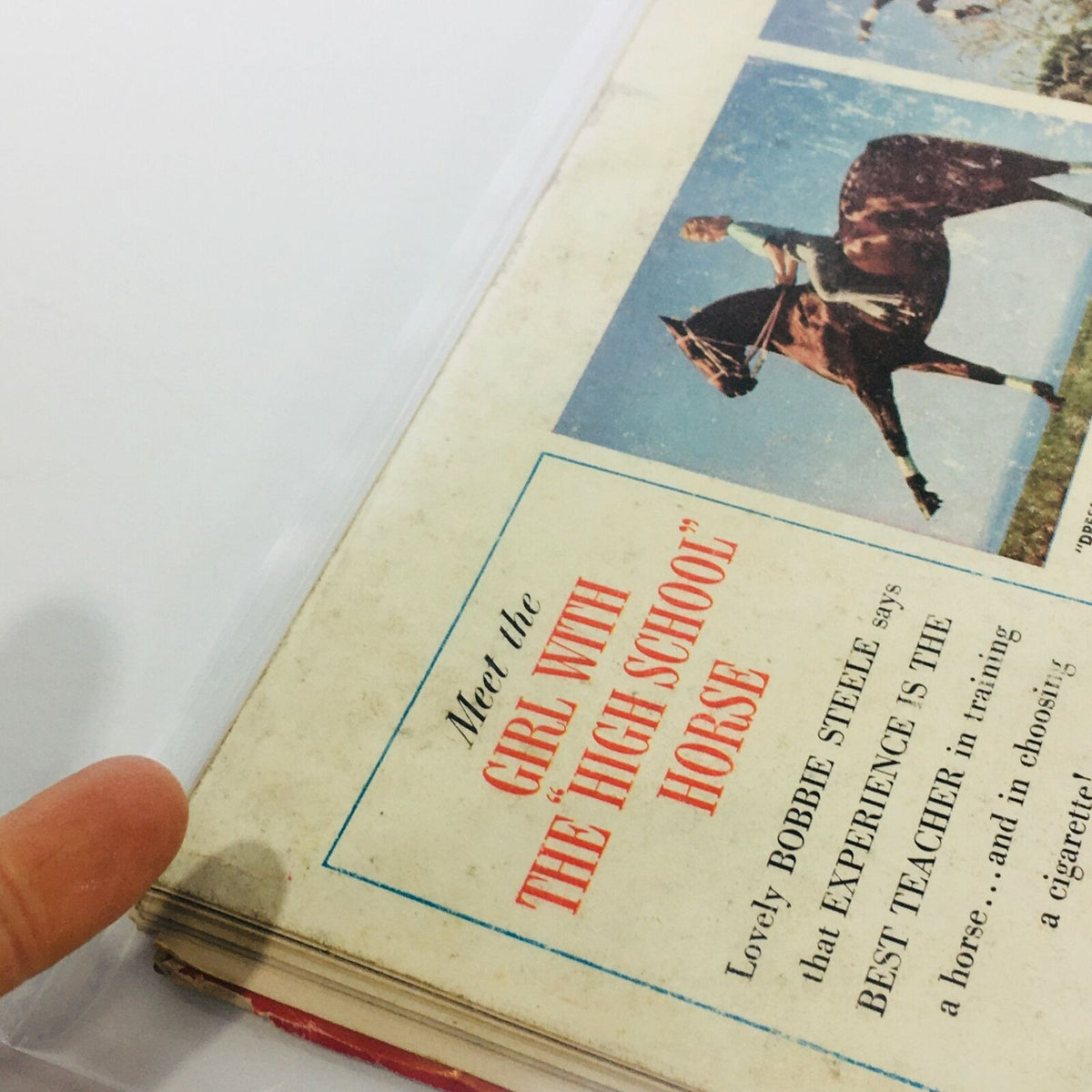 Inside page of the VTG Life Magazine: Oct 25 1948, featuring an article titled 'Meet the Girl with the High School Horse' alongside a captivating image.