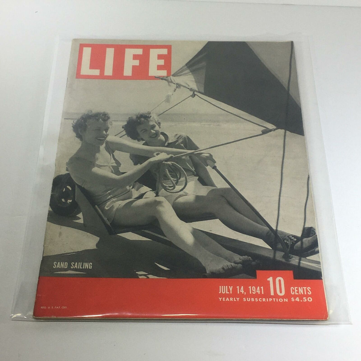 Vintage Life Magazine Cover: July 14, 1941 featuring sand sailing, showcasing two women enjoying the sport in a retro aesthetic. Perfect for collectors of vintage publications.