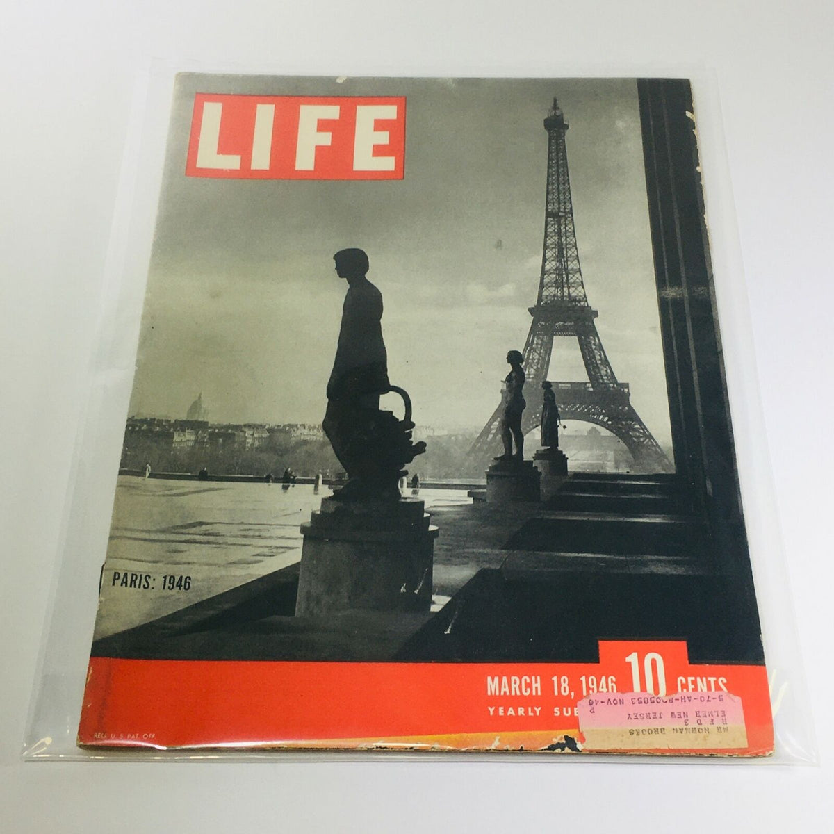 Cover of VTG Life Magazine from March 18, 1946, featuring a silhouette against the Eiffel Tower in Paris, highlighted by the magazine's iconic red title.