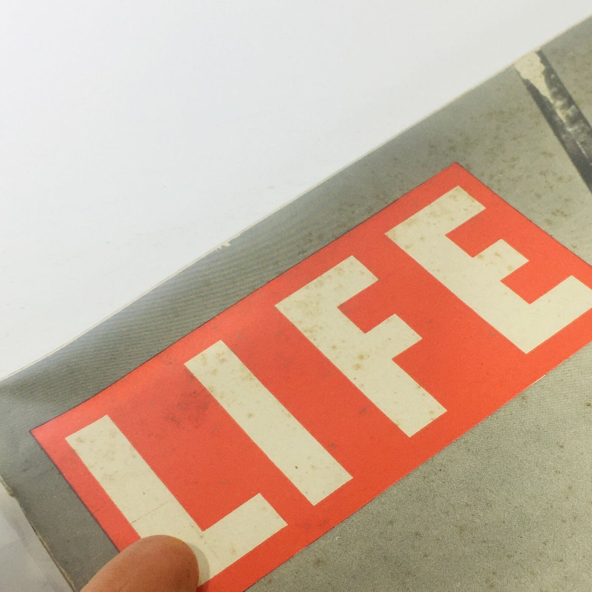 Detailed shot of the title logo on the cover of Vintage Life Magazine: September 27 1937, emphasizing the iconic 'LIFE' magazine branding.