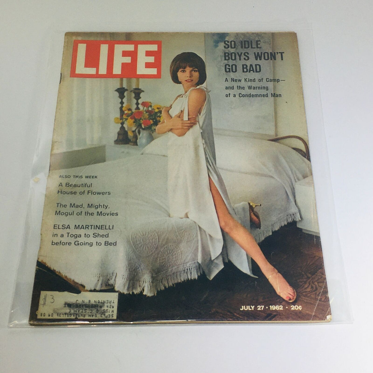Cover of VTG Life Magazine: July 27, 1962 featuring the headline 'So Idle Boy's Won't Go Bad' with a woman in a white dress posed on a bed.