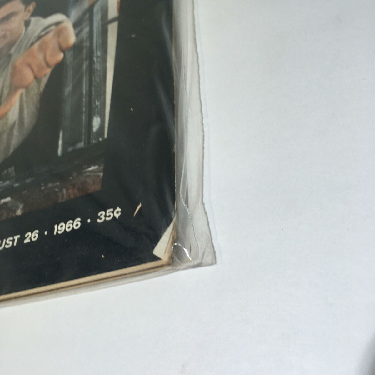 Close-up view of the VTG Life Magazine dated August 26, 1966, emphasizing the magazine's date and price, along with a protective plastic wrap highlighting its vintage condition.