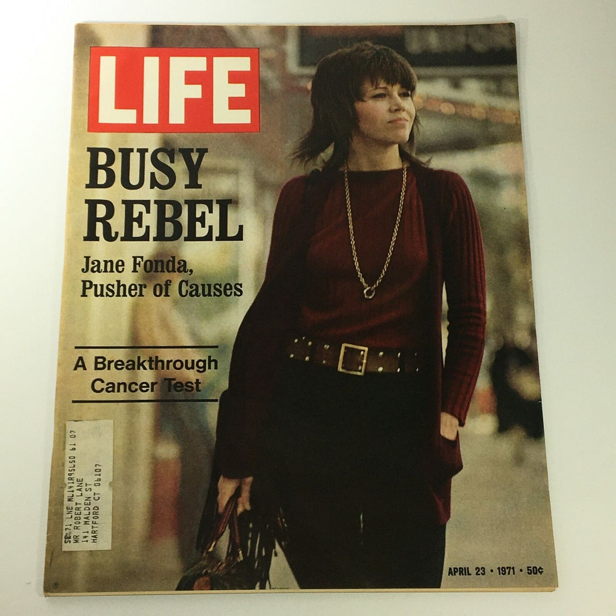 Vintage Life Magazine cover from April 23, 1971 featuring Jane Fonda as 'Busy Rebel'. The magazine highlights her role as an influential figure in activism and Hollywood, showcasing a pivotal moment in cultural history.