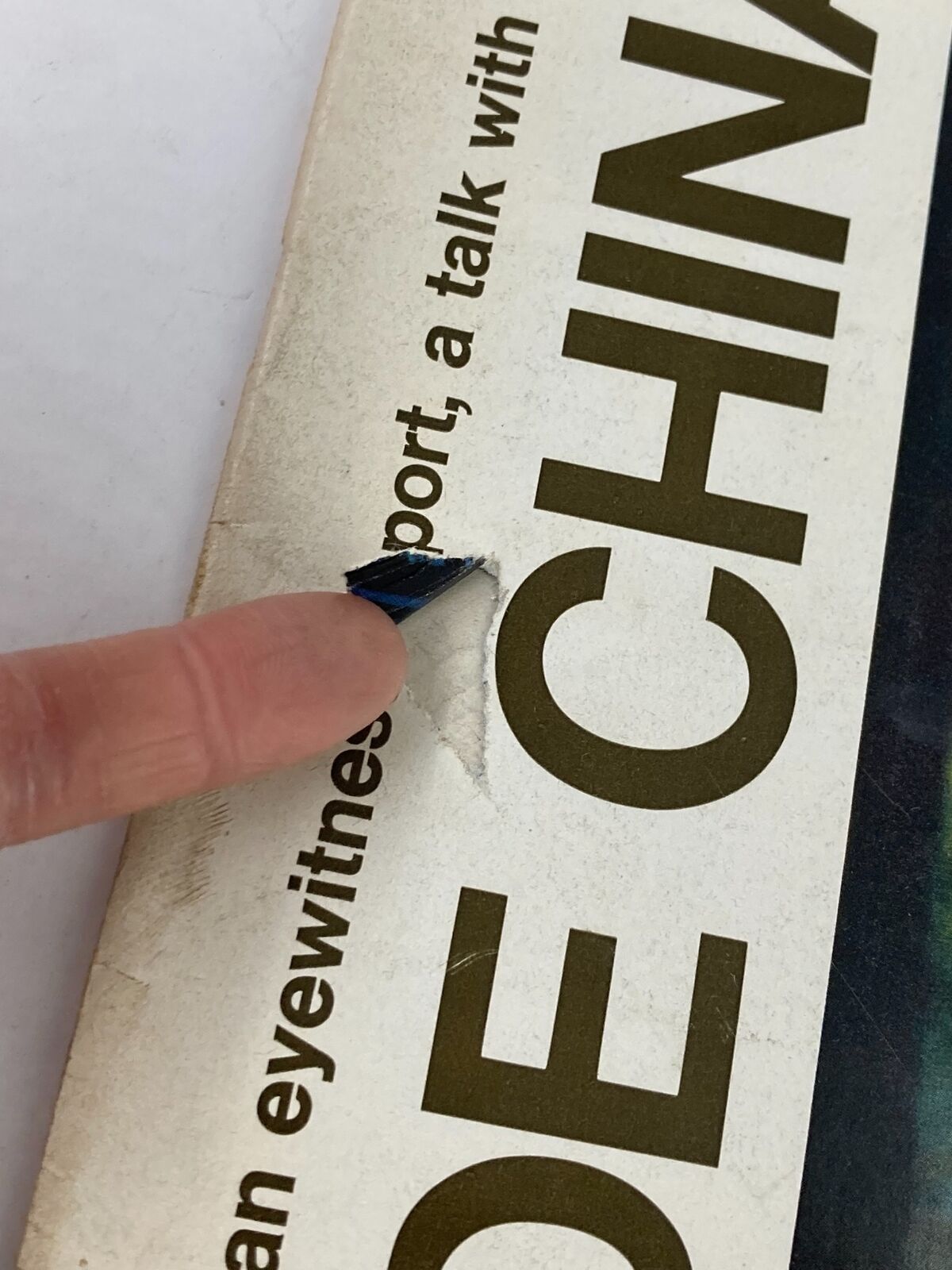 Close-up of the edge of VTG Life Magazine April 30 1971, showing minor wear and a rip on the cover, showcasing its vintage condition.
