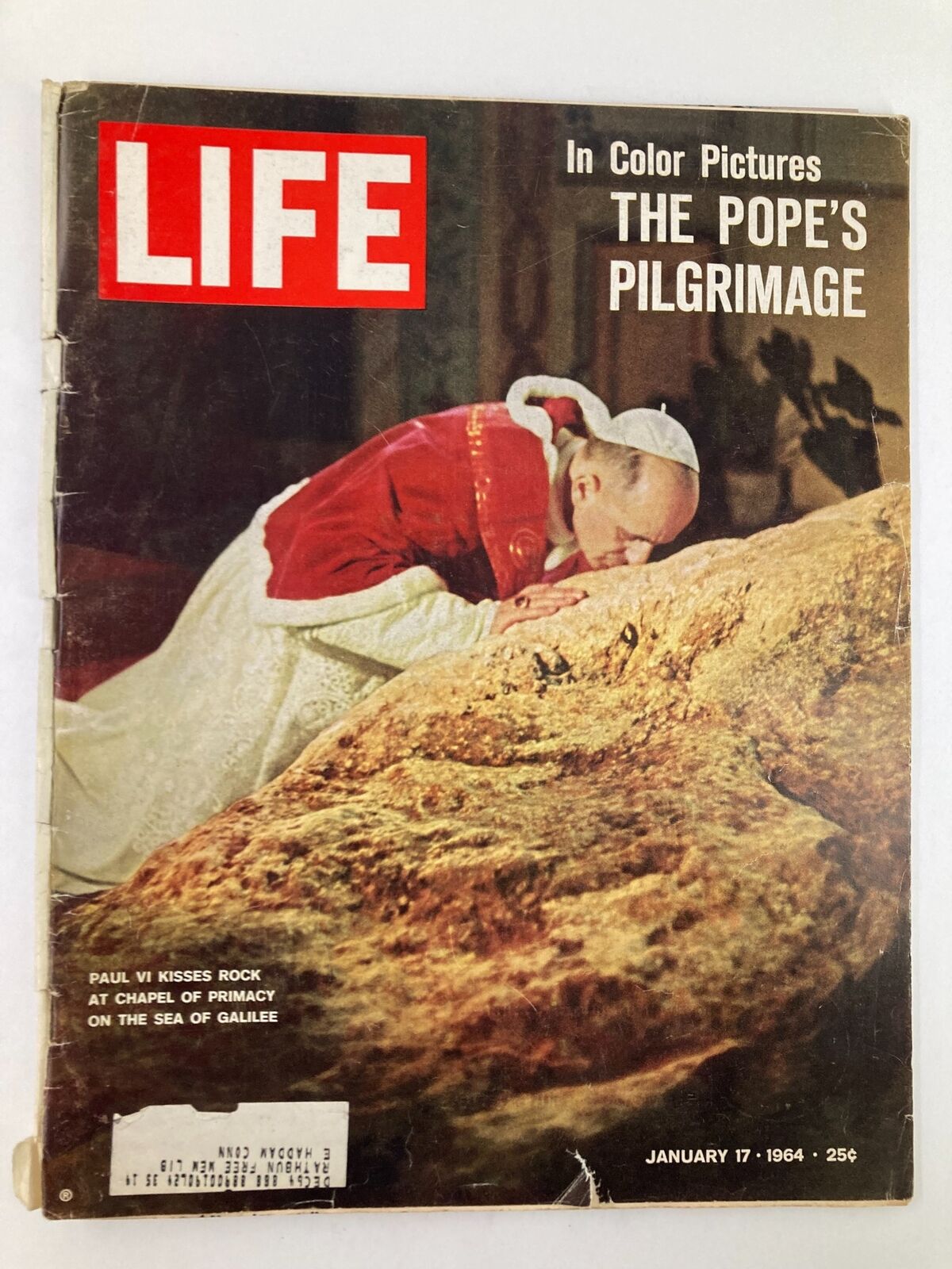 Cover of VTG Life Magazine January 17 1964 featuring Pope Paul VI kissing a rock at the Sea of Galilee, highlighting his significant pilgrimage.