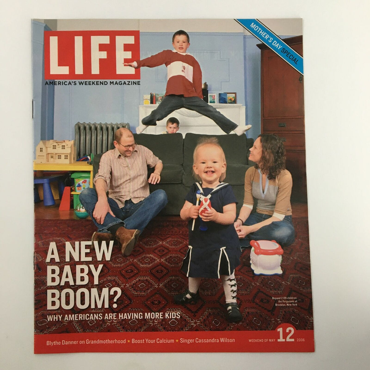 Life Magazine cover featuring the title 'A New Baby Boom?' from May 12, 2006, showcasing a family scene with children playing and parents engaged, reflecting the societal changes and family dynamics of the mid-2000s.