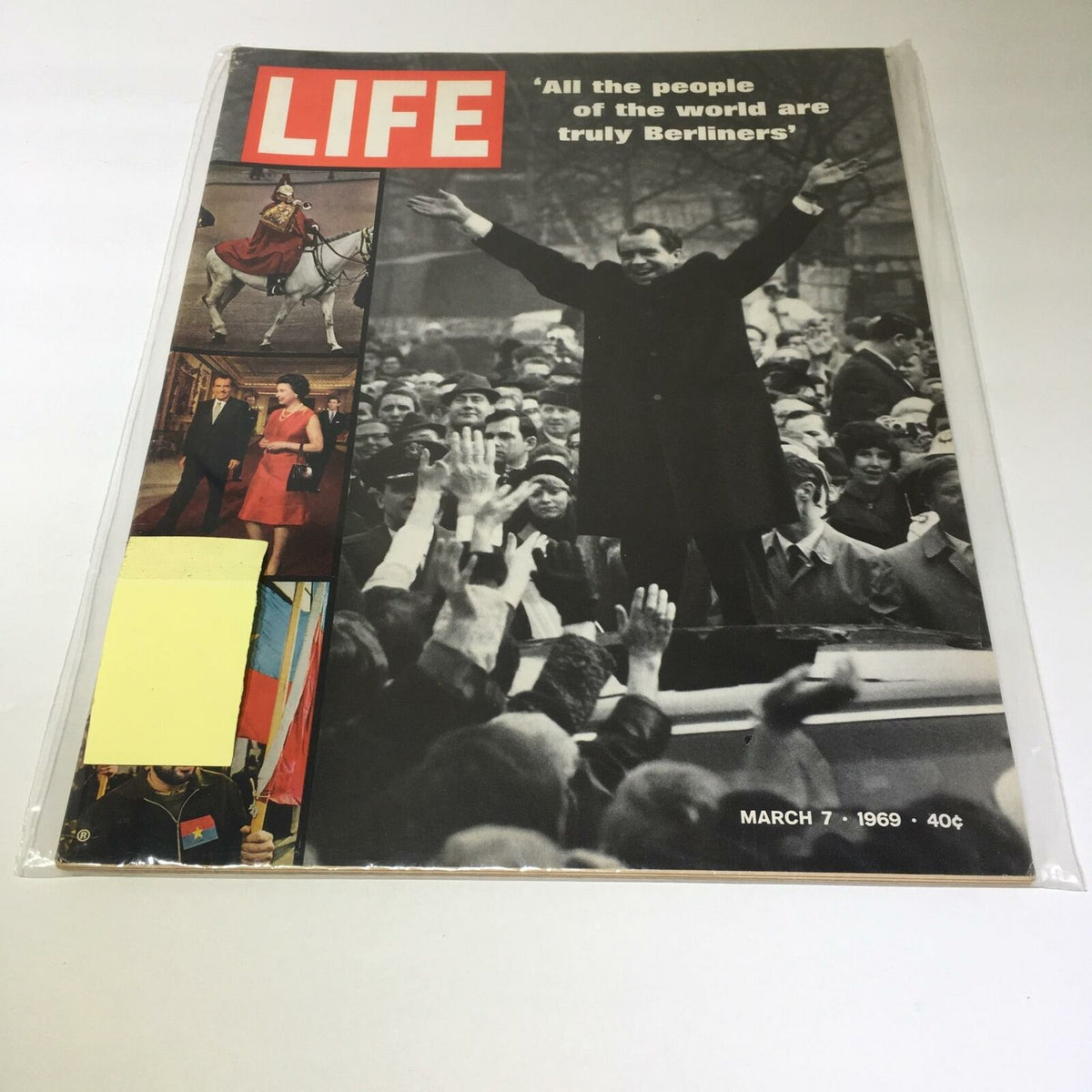 Cover of VTG Life Magazine March 7, 1969 featuring a historic moment with Richard Nixon and the caption 'All the people of the world are truly Berliners'. The image showcases a crowd celebrating with their hands raised during a significant event, illustrating the magazine's focus on political and cultural themes of the time.