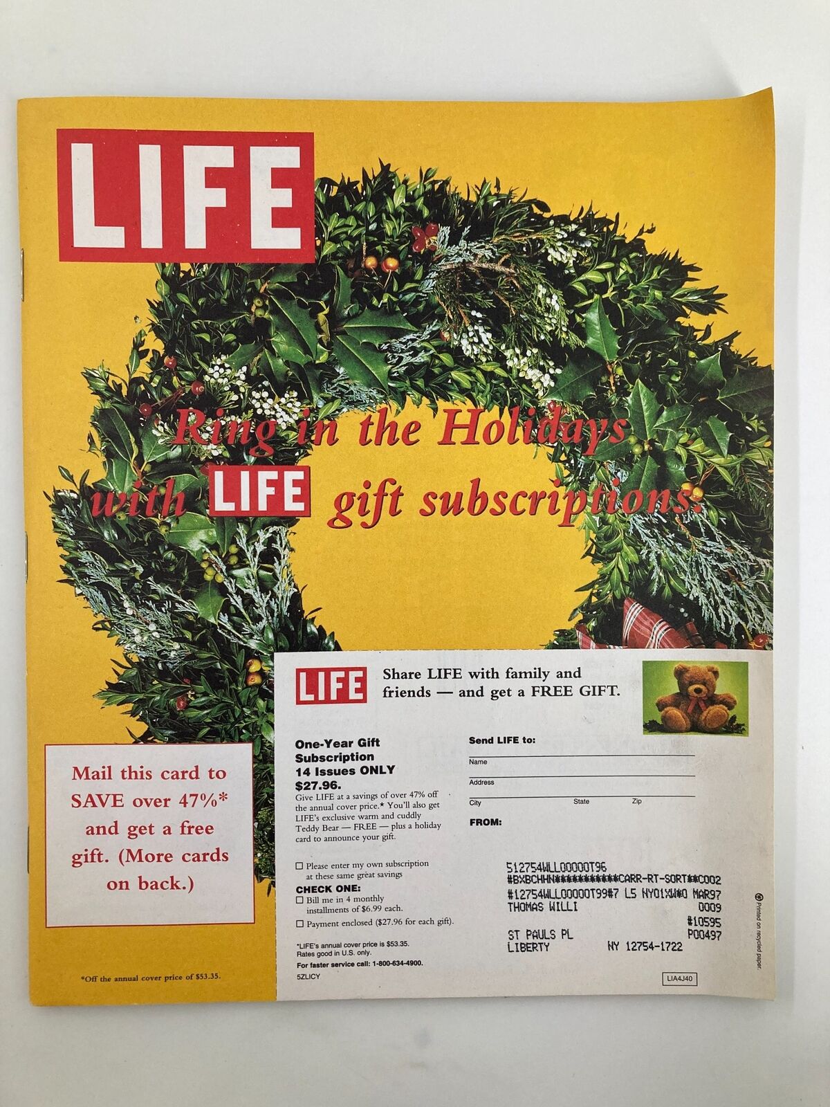 Cover image of Life Magazine December 1995, featuring a holiday wreath and the text 'Ring in the Holidays with LIFE gift subscriptions'. This edition is themed 'On The Trail of Angels', exploring spiritual themes.