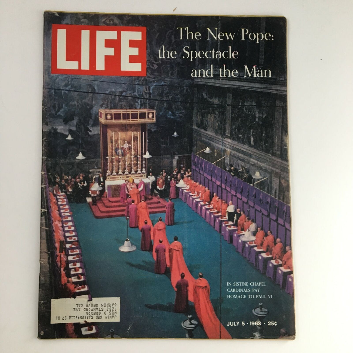 Life Magazine cover from July 5, 1963, featuring a moment inside the Sistine Chapel where Cardinals pay homage to Pope Paul VI, capturing a significant event in Catholic history.