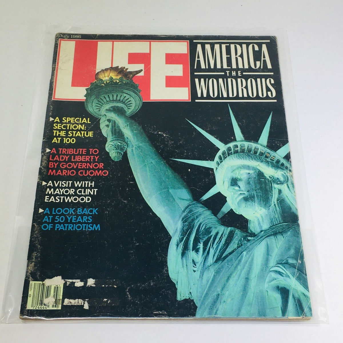 Cover of VTG Life Magazine from July 1986, featuring the statue of liberty under the title 'America The Wondrous.' The design highlights a tribute to Lady Liberty with notable articles and imagery associated with American history.