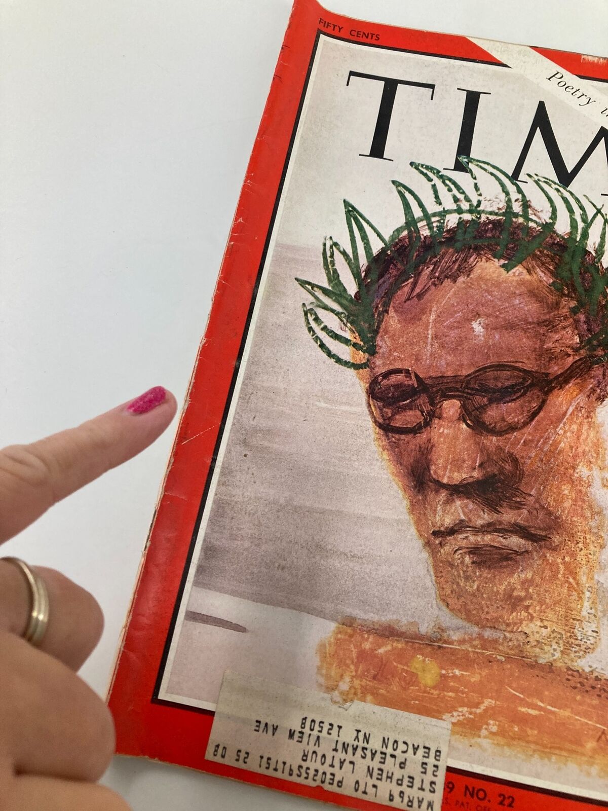 Close-up of the vintage Time Magazine cover from June 2, 1967, highlighting Robert Lowell and the inscription 'Poetry in an Age of Prose'.