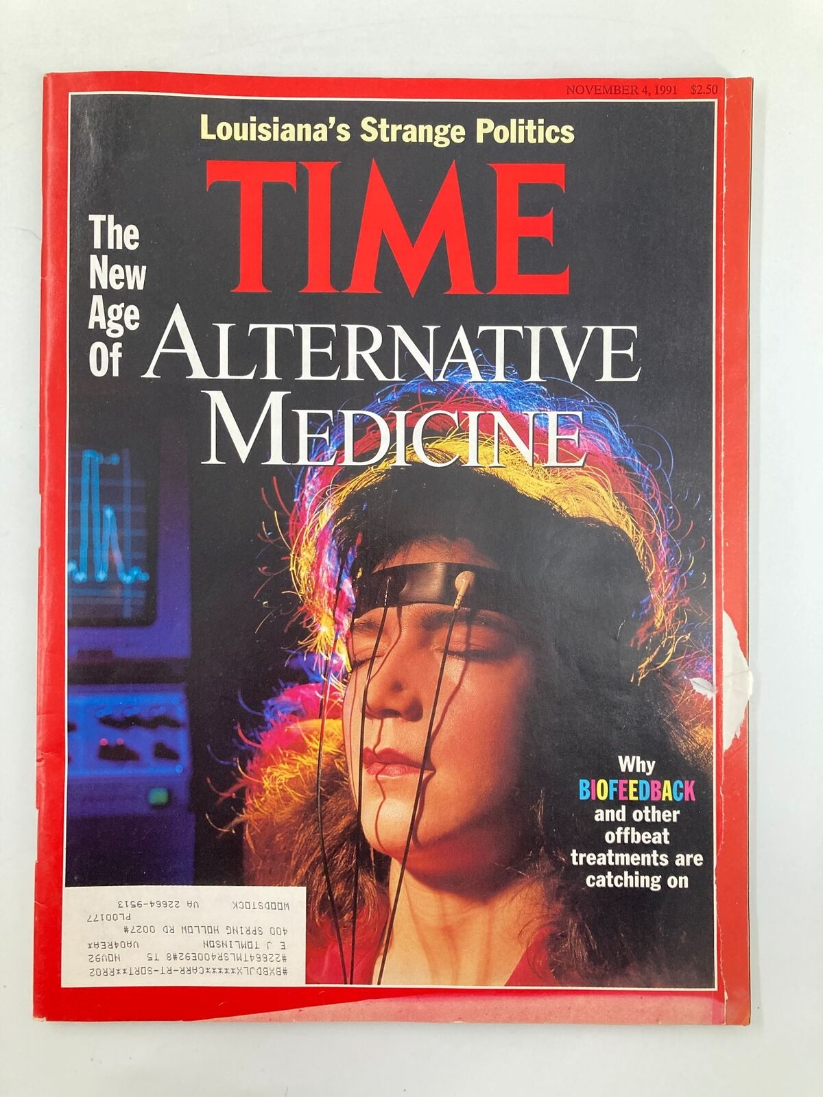 Cover of the vintage Time Magazine from November 4, 1991, featuring the headline 'The New Age of Alternative Medicine' with a woman undergoing biofeedback treatment showcased prominently on the cover.