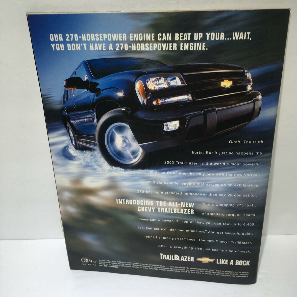 Advertisement for the 2002 Chevy Trailblazer, highlighting its powerful 270-horsepower engine in an automotive context.