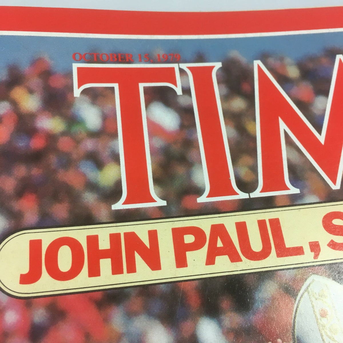 Close-up detail of the Time Magazine date 'October 15, 1979' with the title 'John Paul Superstar'.