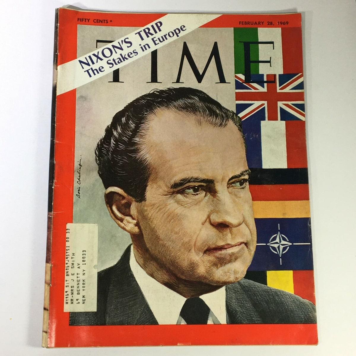 Vintage Time Magazine cover from February 28, 1969, featuring Richard Nixon with the headline 'Nixon's Trip: The Stakes in Europe', showcasing a portrait of Nixon set against various European flags.