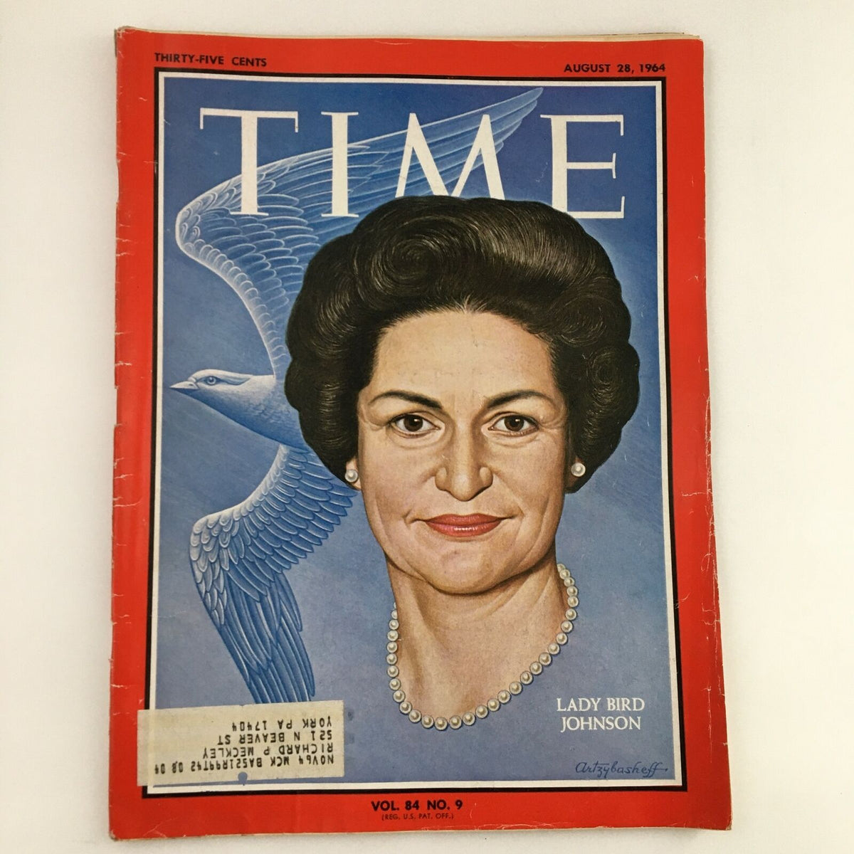 Cover of Time Magazine from August 28, 1964, featuring First Lady Lady Bird Johnson, with a vibrant illustration and a backdrop of a blue bird.