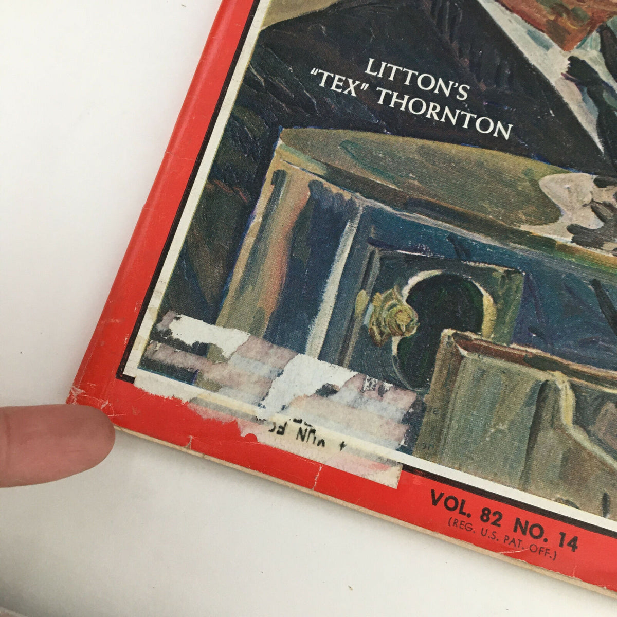 Close-up of the Time Magazine cover dated October 4, 1963, showing details about Litton's 'Tex' Thornton and minor imperfections, illustrating vintage magazine wear.