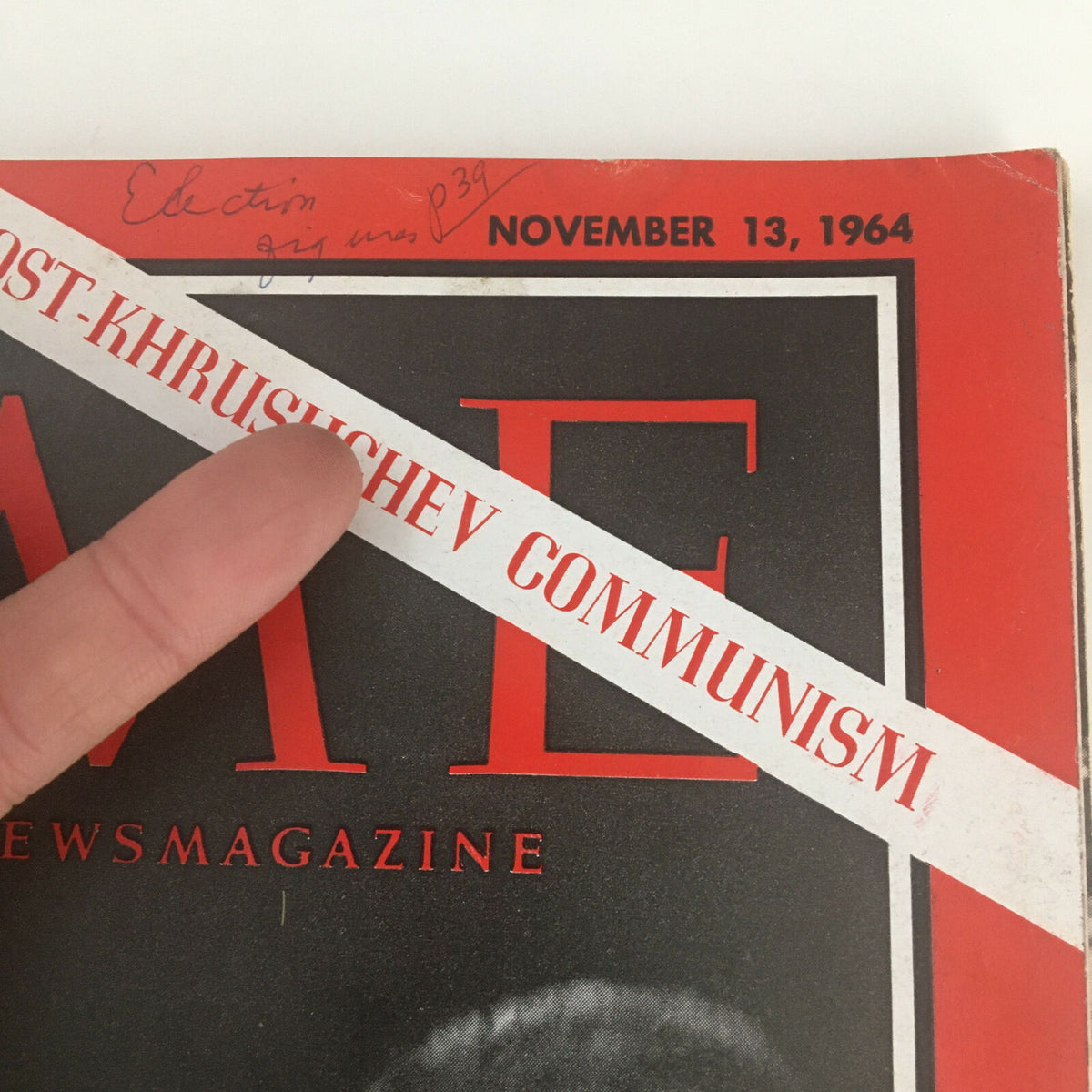 Detail shot of Time Magazine November 13, 1964, cover, emphasizing the post-Khrushchev communism banner and finger pointing to notes.