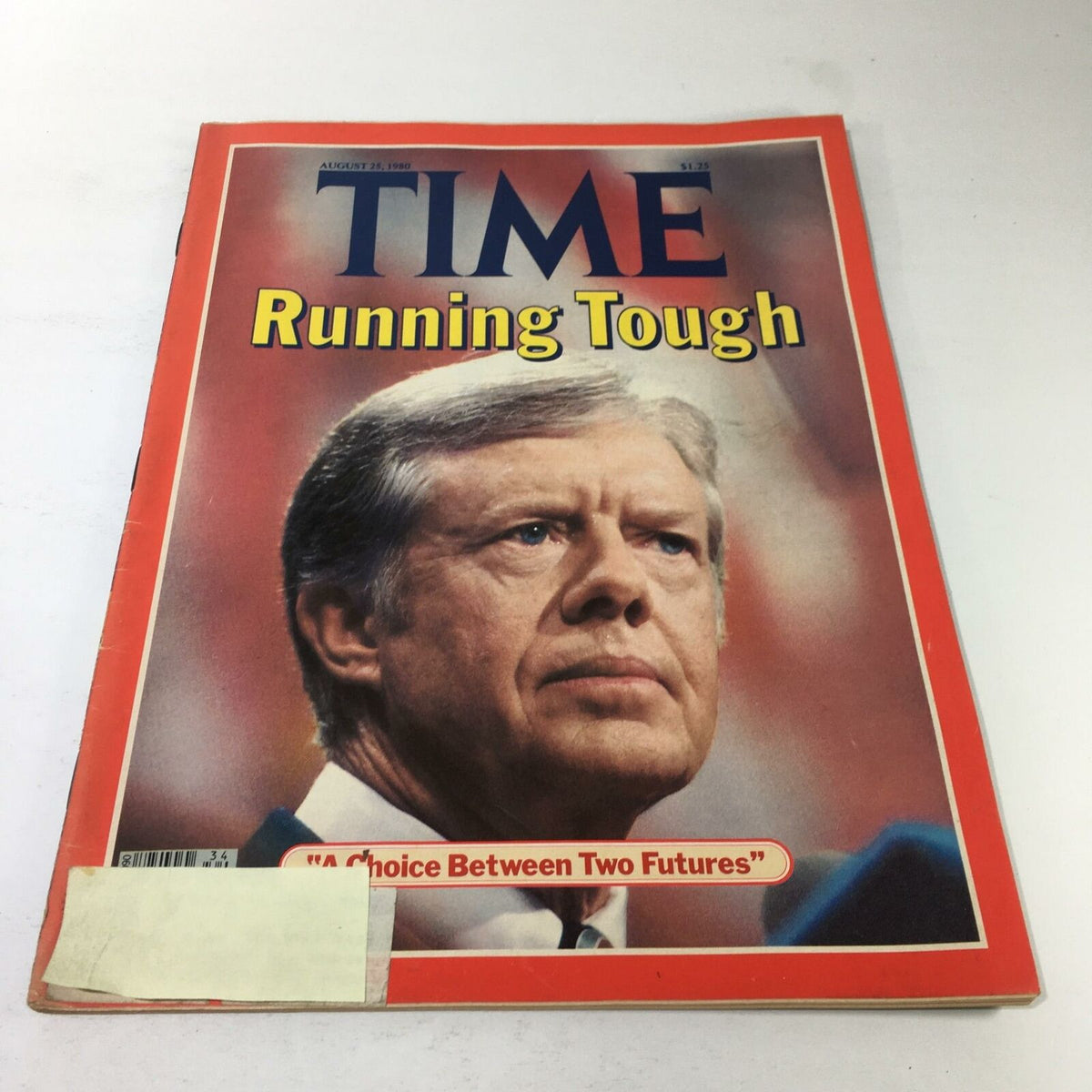 Time Magazine cover from August 25, 1980, featuring Jimmy Carter with the title 'Running Tough'. The magazine showcases Carter's serious expression, highlighting a pivotal moment in political history.