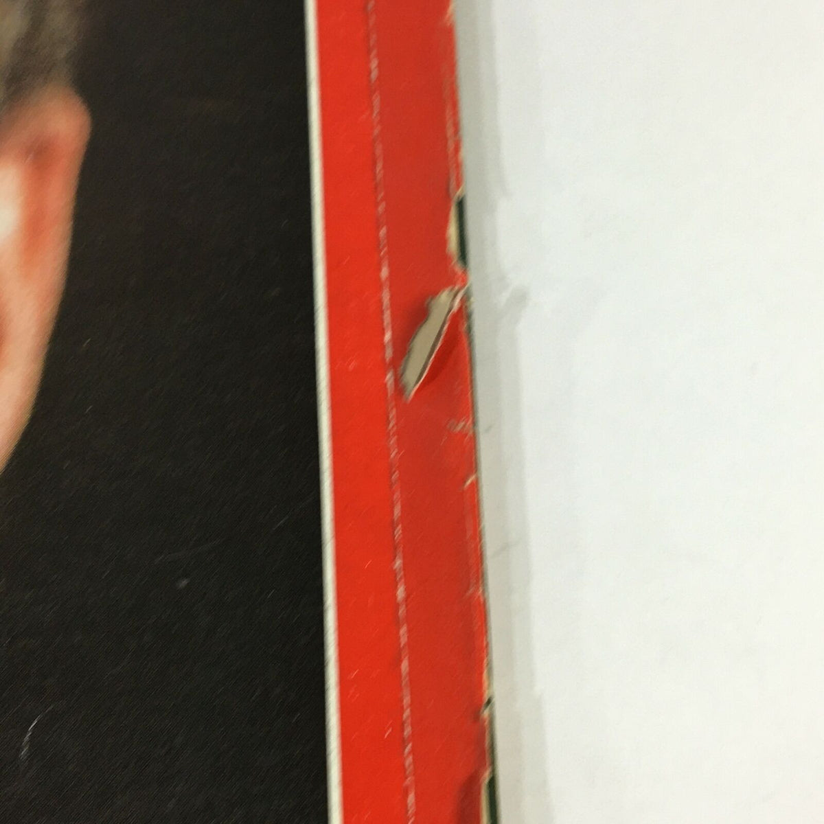 Close-up of the edge of the vintage Time Magazine from March 16, 1970, showing minor wear and tear, highlighting its collectible condition.