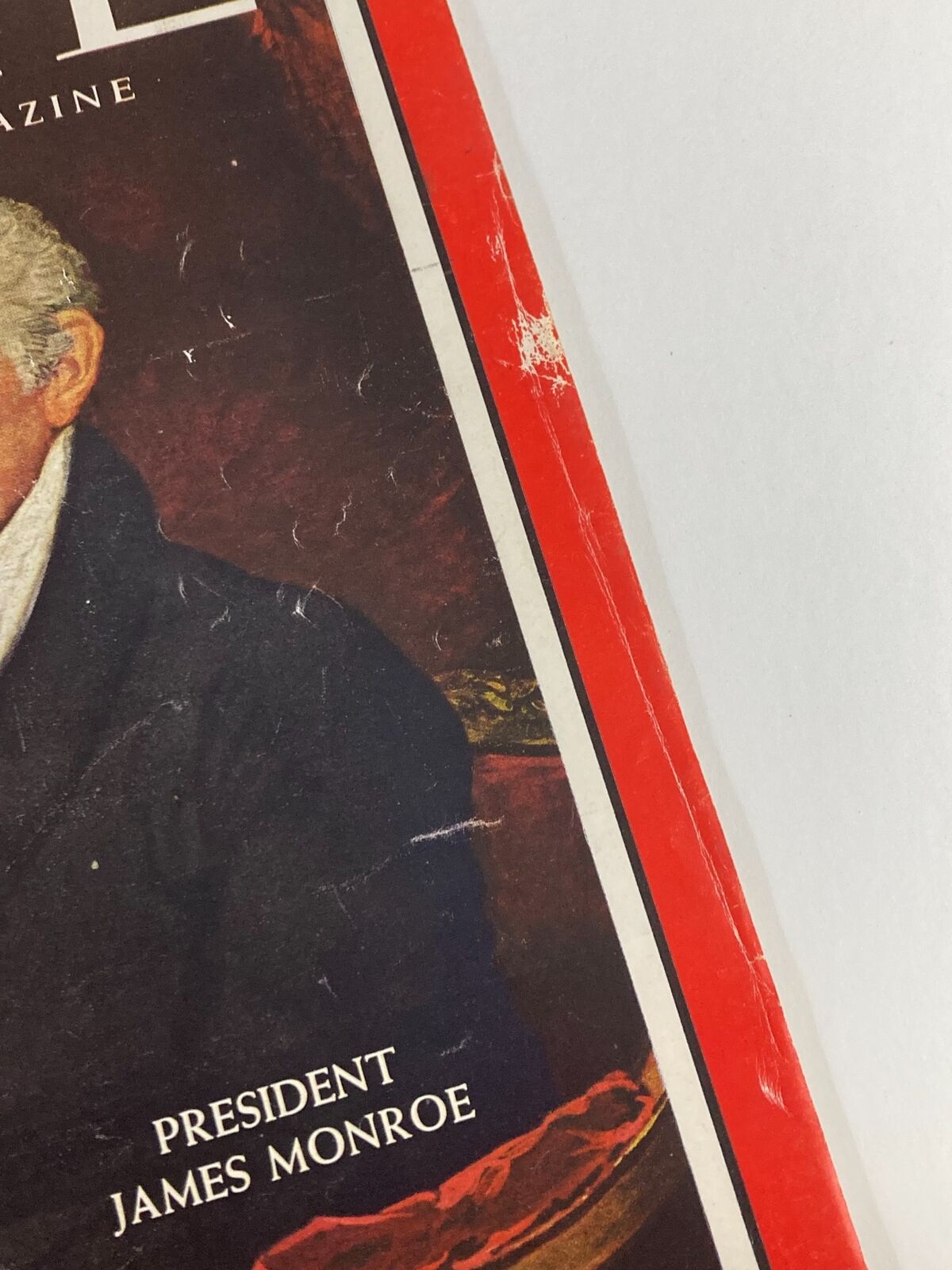 Close-up of the VTG Time Magazine Cover from September 21, 1962, featuring President James Monroe, showing wear and tear that adds to its vintage character.