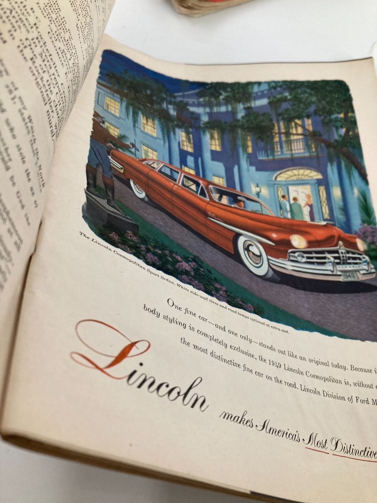 Interior page of VTG Time Magazine April 25, 1949 showcasing a vintage advertisement for the 1949 Lincoln Cosmopolitan luxury car.