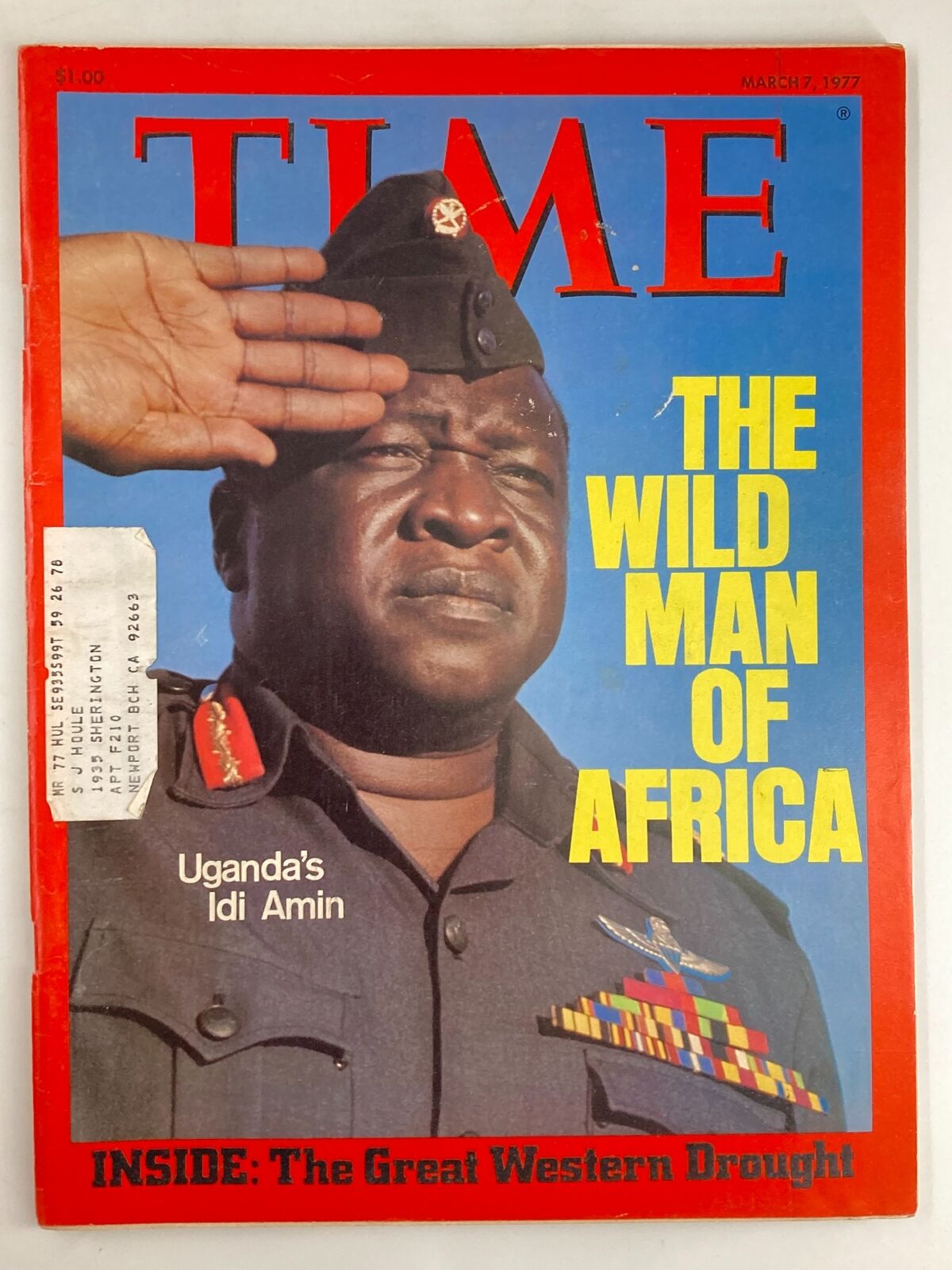 Cover of VTG Time Magazine March 7 1977 featuring Uganda's Idi Amin, with a bold title 'THE WILD MAN OF AFRICA,' showcasing a striking image of Idi Amin saluting in military attire.