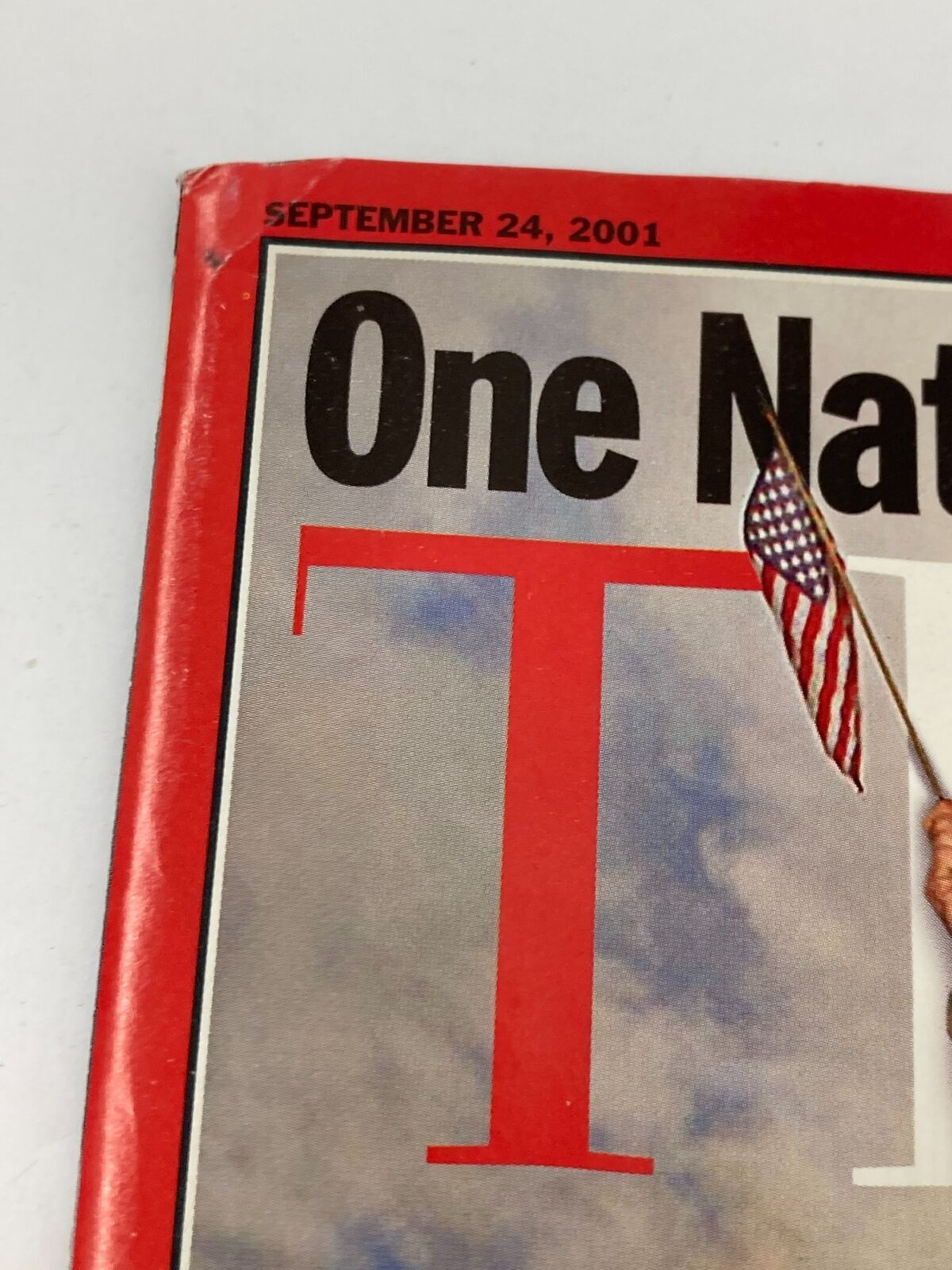 Close-up of the Time Magazine September 24 2001 cover date, highlighting the significance of the issue released shortly after the September 11 attacks.