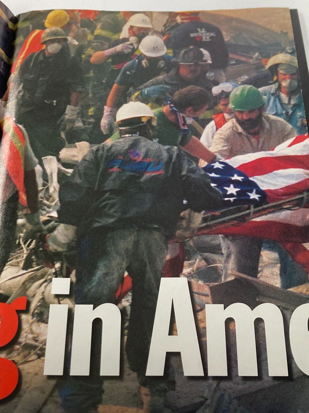 Time Magazine September 24 2001 featuring volunteers and first responders rescuing and honoring victims of the 9/11 attacks.