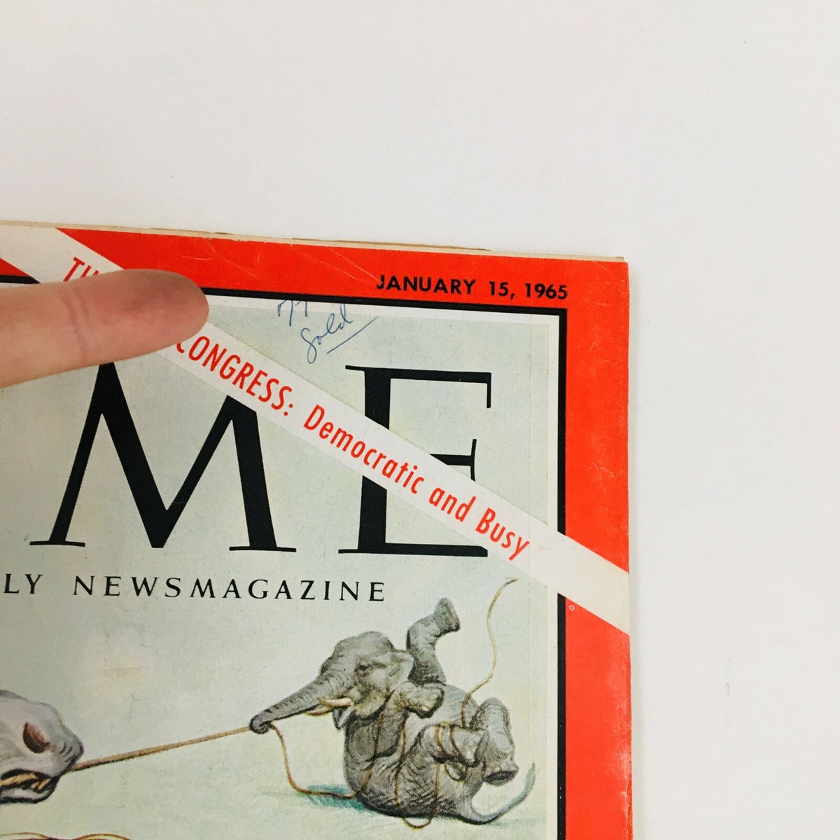 Close-up view of Time Magazine January 15, 1965, cover showing the text 'The New Congress: Democratic and Busy' along with a signature, Volume 85, No. 3.