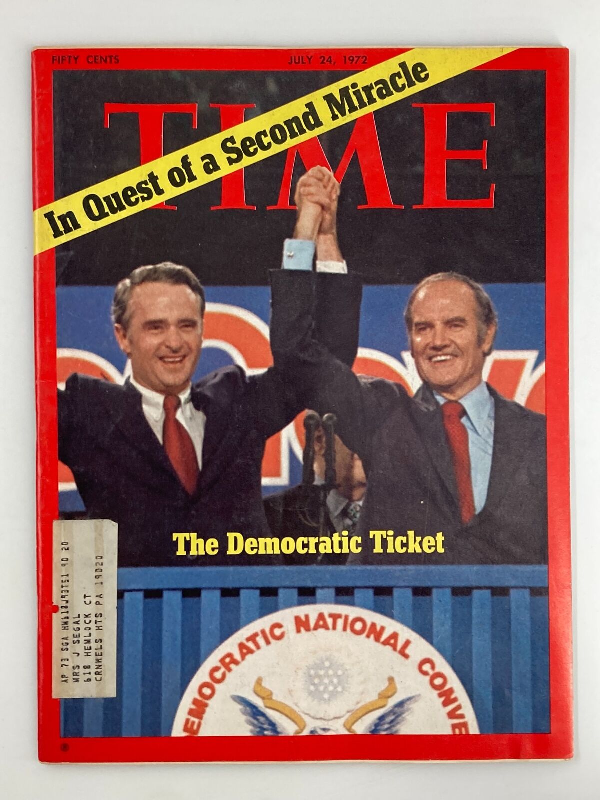 Vintage Time Magazine from July 24, 1972 featuring George McGovern and the Democratic Ticket. The cover highlights the pivotal Democratic National Convention with the headline 'In Quest of a Second Miracle' and showcases two men holding hands in celebration. Ideal for collectors and history lovers.