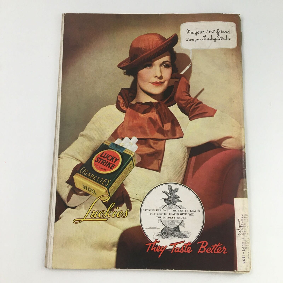 Vintage advertisement for Lucky Strike cigarettes on the cover of an old magazine, showcasing a woman with stylish attire, promoting the product as a classic.