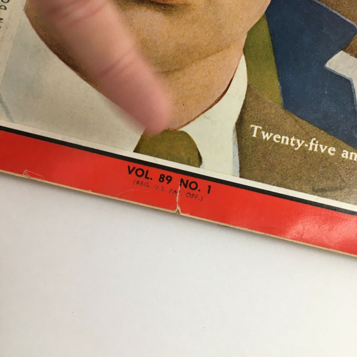 Close-up of Time Magazine January 6 1967 Vol. 89 No. 1, highlighting the volume and issue number, with the cover art depicting a young man's face and the theme 'Twenty-five and Under'.