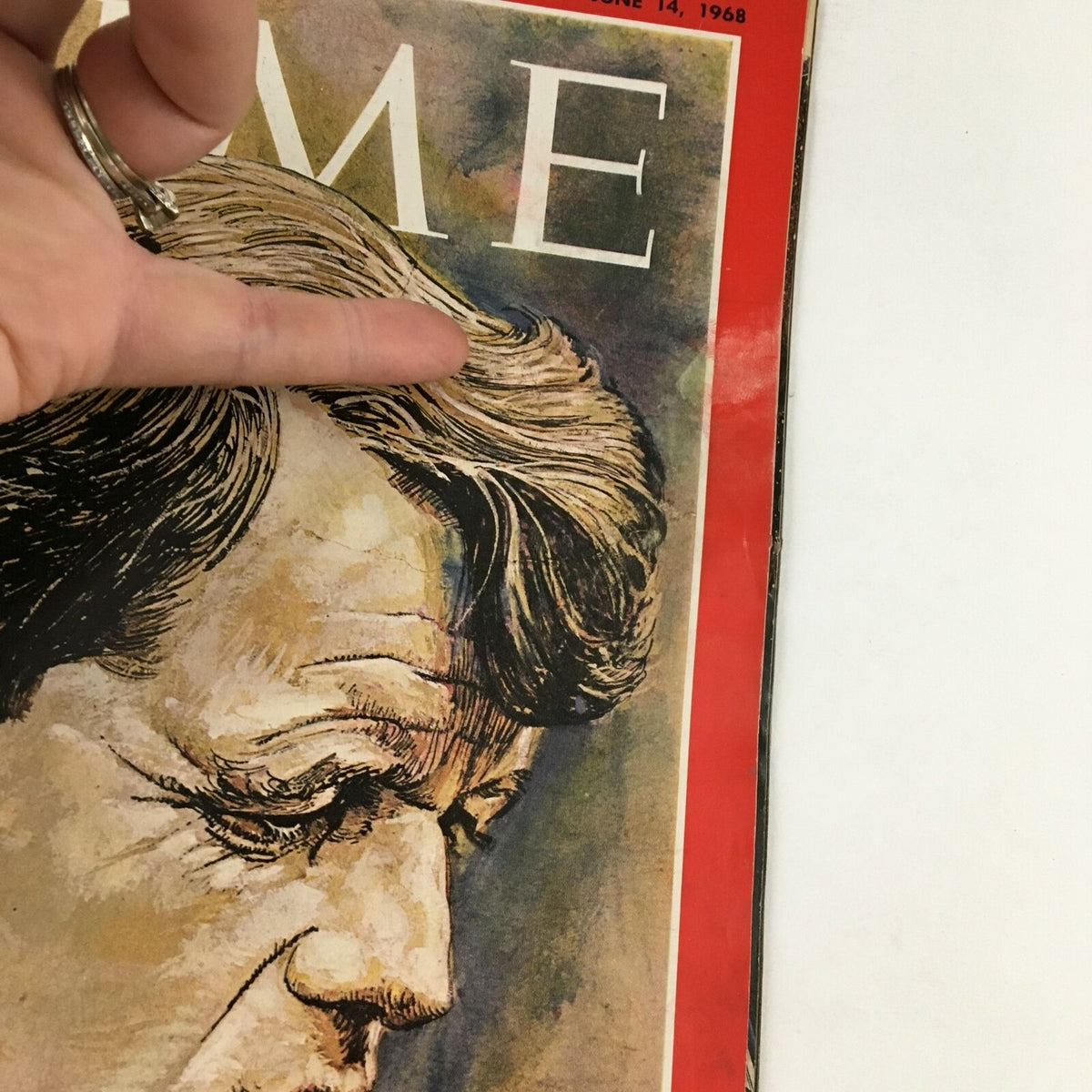 Close-up view of the Time Magazine Cover June 14, 1968 with Robert F. Kennedy's portrait, showcasing the magazine's details and condition.