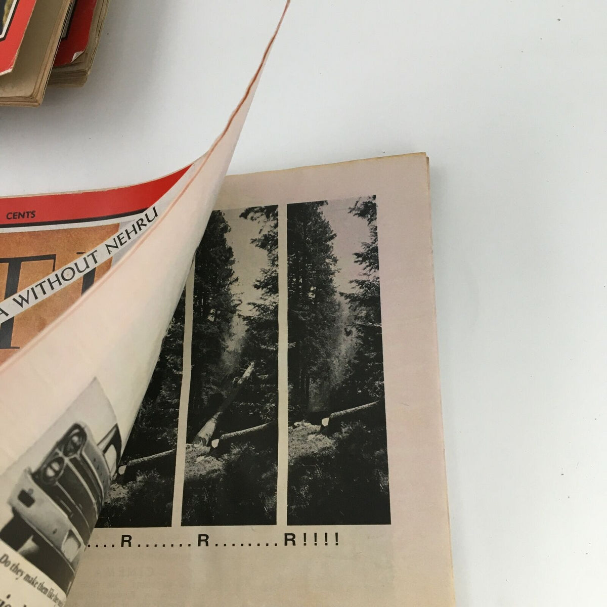 Inside glimpse of Time Magazine August 13, 1965, Vol 86 #7, featuring a section of the pages with vintage images related to the publication's content.