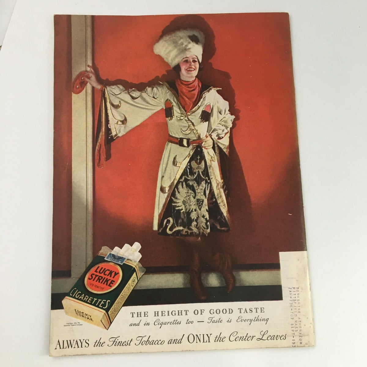 Colorful advertisement from Time Magazine, February 26, 1934, promoting Lucky Strike cigarettes, showcasing a stylish woman dressed in vintage fashion.