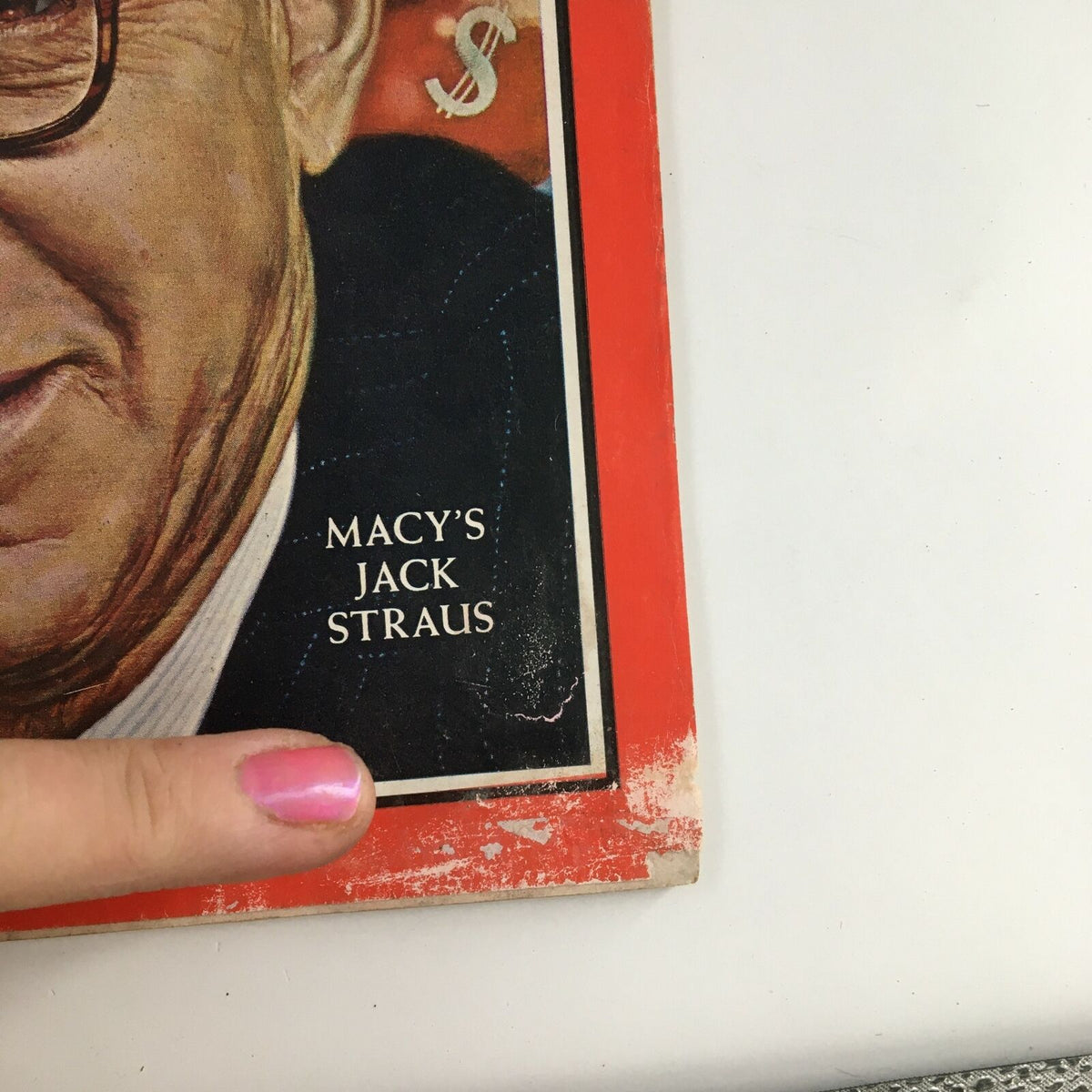 Close-up of Time Magazine January 8, 1965, Vol 85 #2 highlighting the name 'Macy's Jack Straus' with visible wear on the cover.
