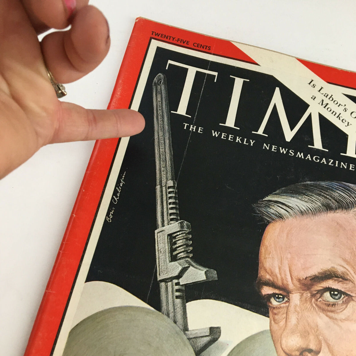 Close-up view of the Time Magazine March 1, 1963 cover highlighting strike leader Bert Powers, featuring a hand pointing towards the illustration of a wrench and the magazine title.