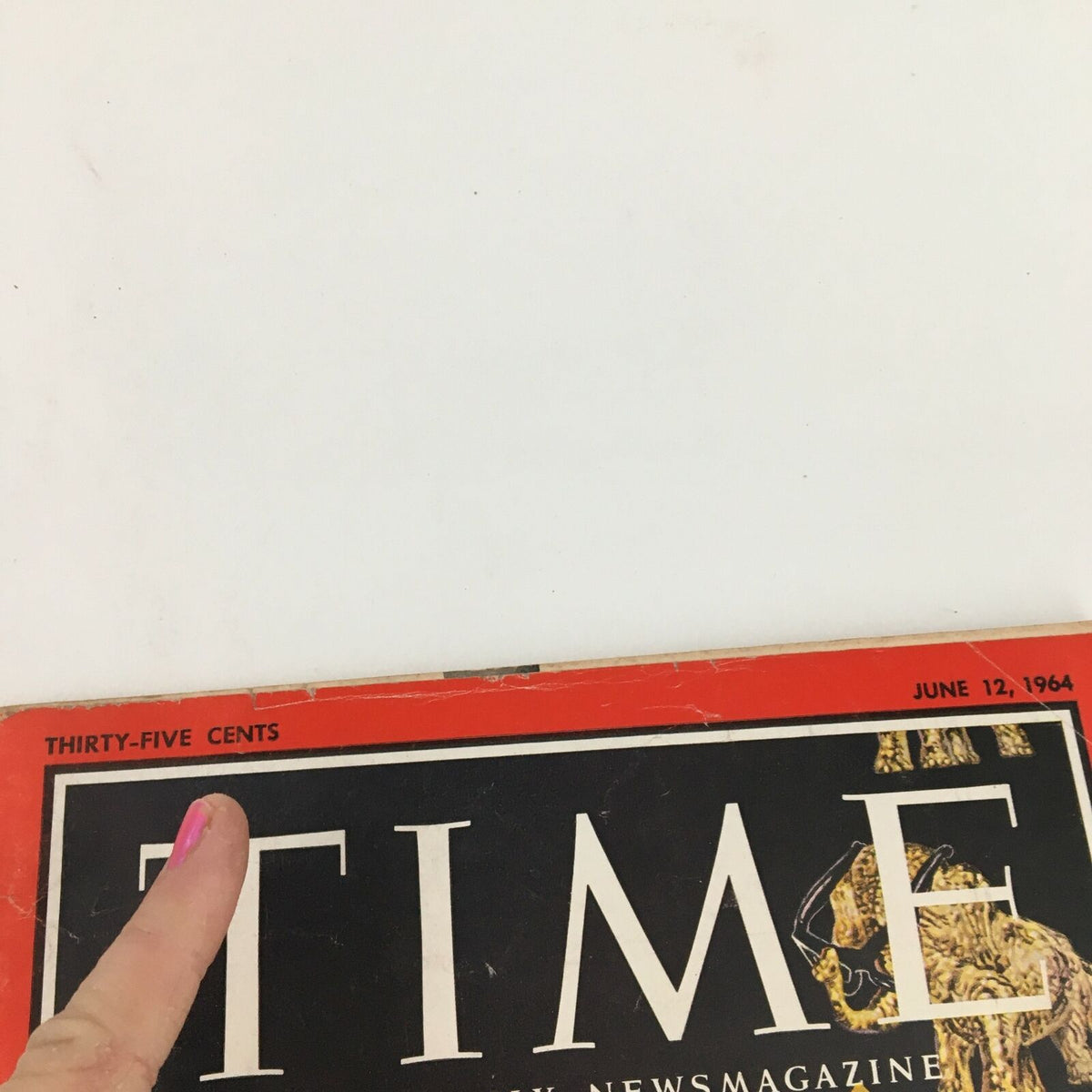 Close-up of the top section of the Time Magazine from June 12, 1964, indicating the magazine's cost of thirty-five cents, featuring the date and title prominently.