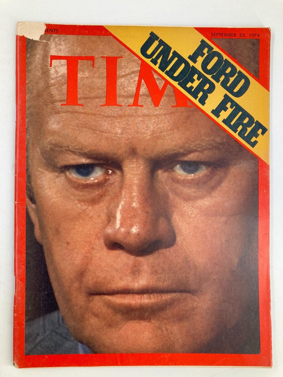 Close-up of the cover of VTG Time Magazine September 23, 1974, featuring Gerald Ford with the headline 'Ford Under Fire', showcasing vintage illustration and historical significance.
