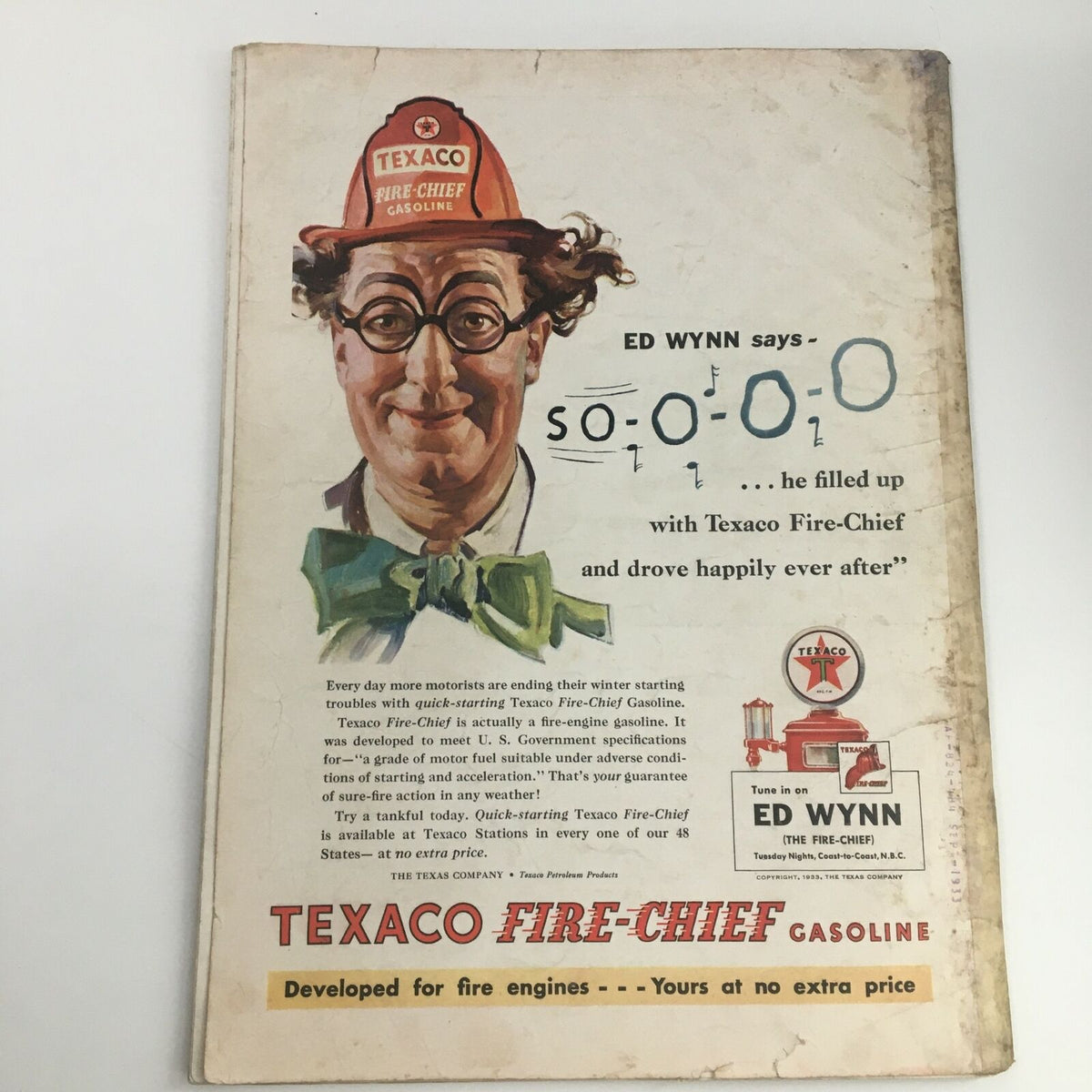 Vintage advertisement featuring Ed Wynn promoting Texaco Fire-Chief gasoline, showcasing humorous imagery with a playful expression. Part of a collectible magazine from Time Magazine February 13 1933 Vol 21 #7 Admiral Richard Henry Leigh.