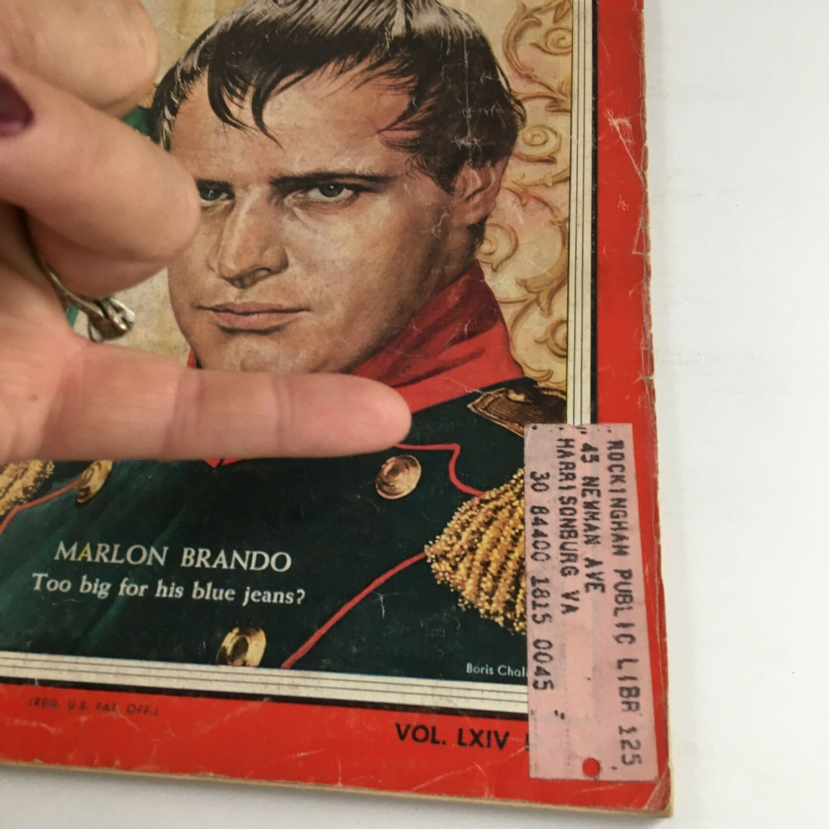 Detailed view of the Time Magazine cover from October 11, 1954 featuring Marlon Brando with a library label affixed, emphasizing its collectible nature.