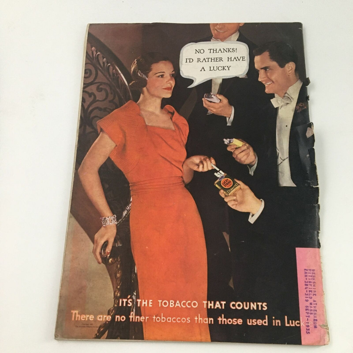 Back cover advertisement of Time Magazine September 9, 1935 featuring a stylish woman in a red dress and a conversation about Lucky cigarettes, reflecting 1930s fashion and marketing.