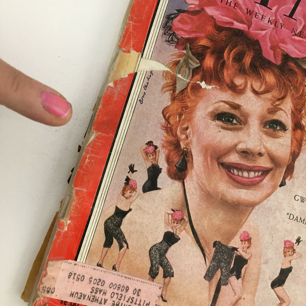 Detailed view of Time Magazine cover from June 13, 1955, highlighting actress Gwen Verdon of 'Damn Yankees' with vintage design elements and signs of wear.