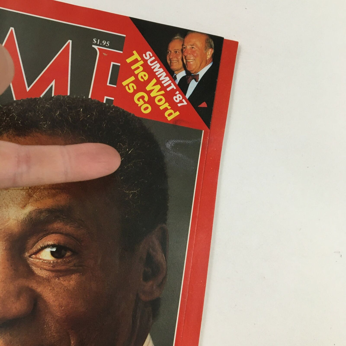 Detail of Time Magazine cover from September 28, 1987 featuring Bill Cosby, showcasing promotional banner 'SUMMIT '87 The Word Is Go.' A great collectible for fans of 1980s entertainment history.